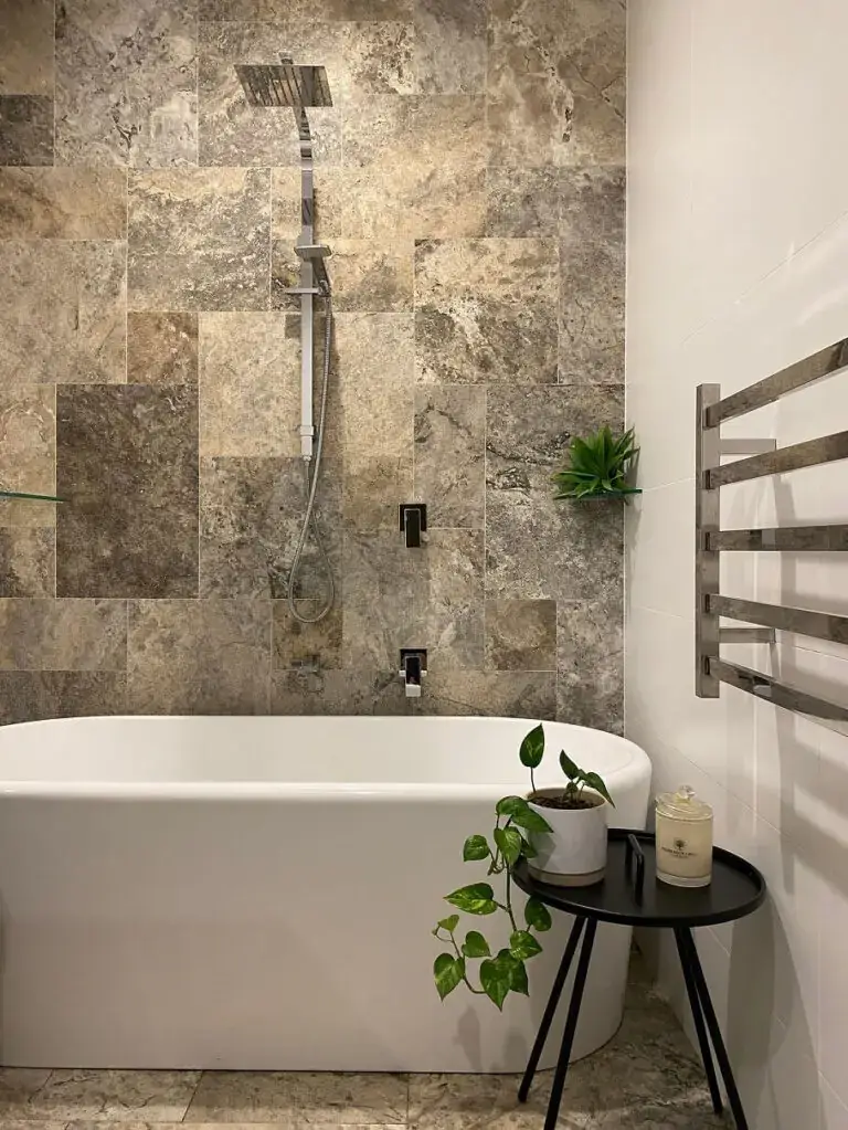 Grey Travertine Tiles in bathroom setting.